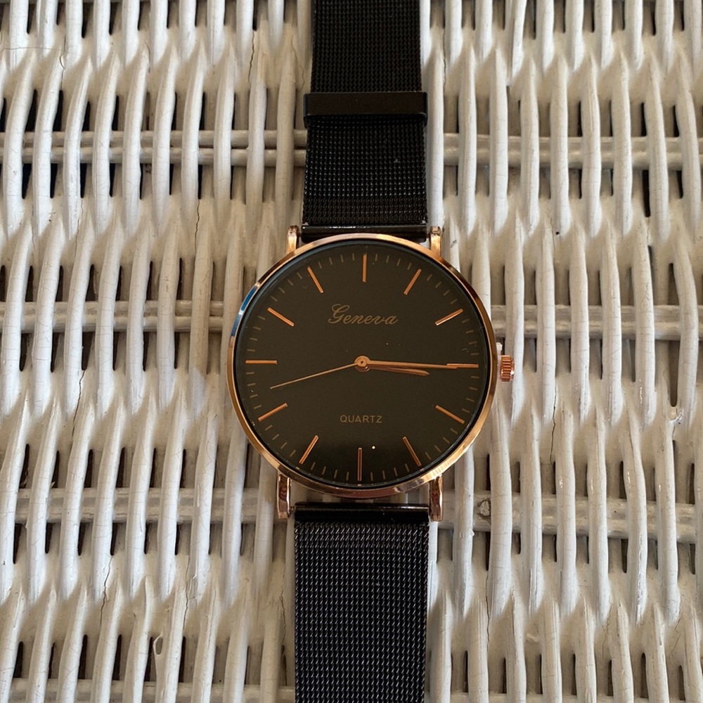 Black Geneva watch. Never worn, no scratches.